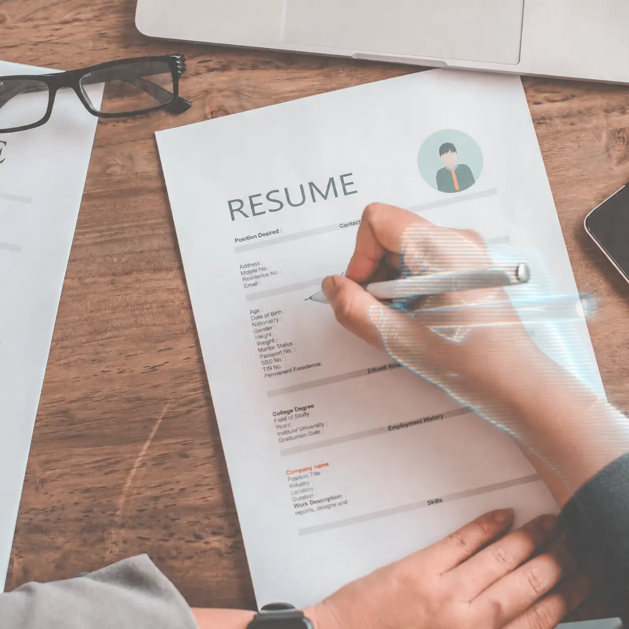 A person edits a resume with AI assistance