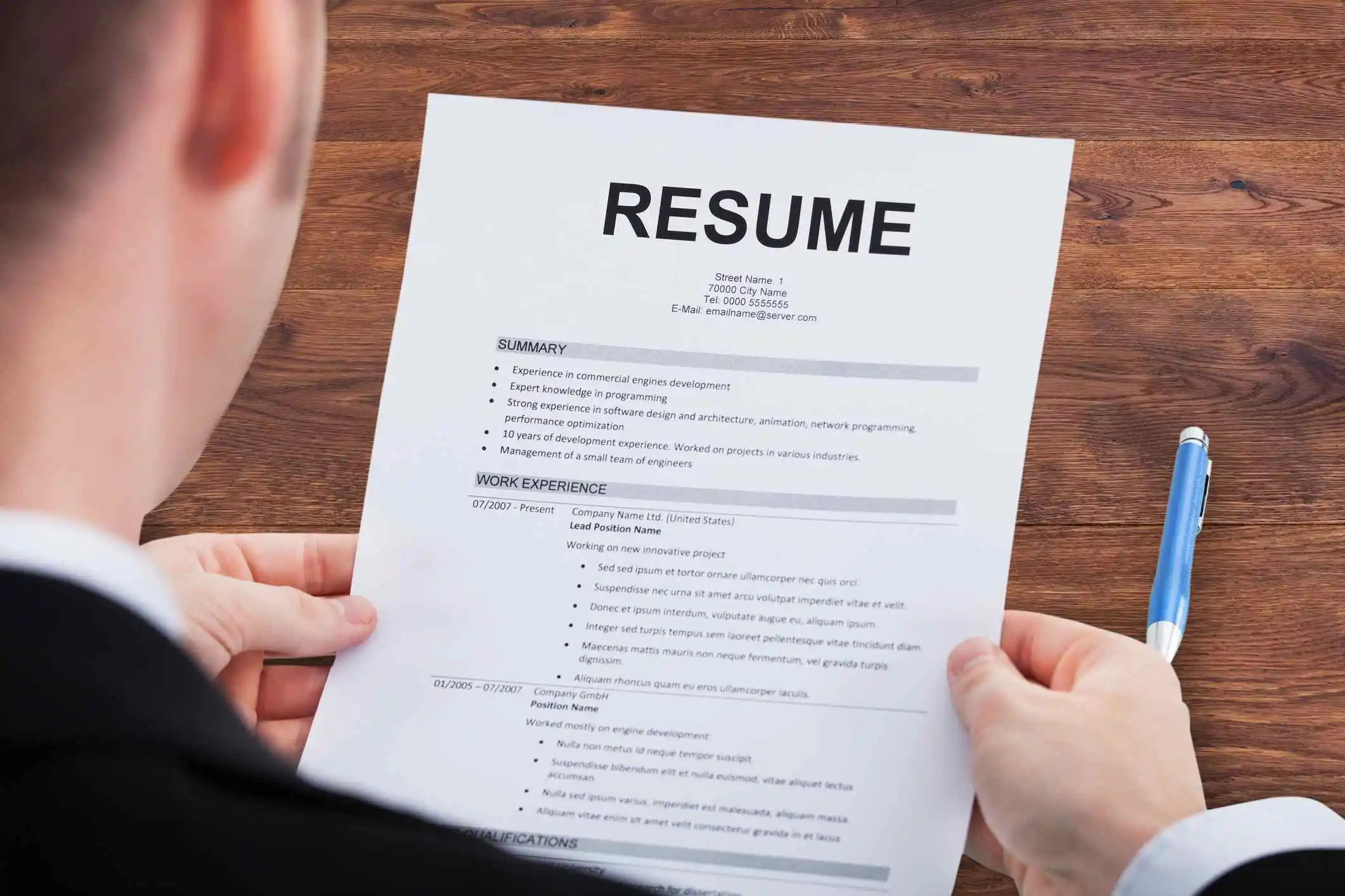 Man holding resume